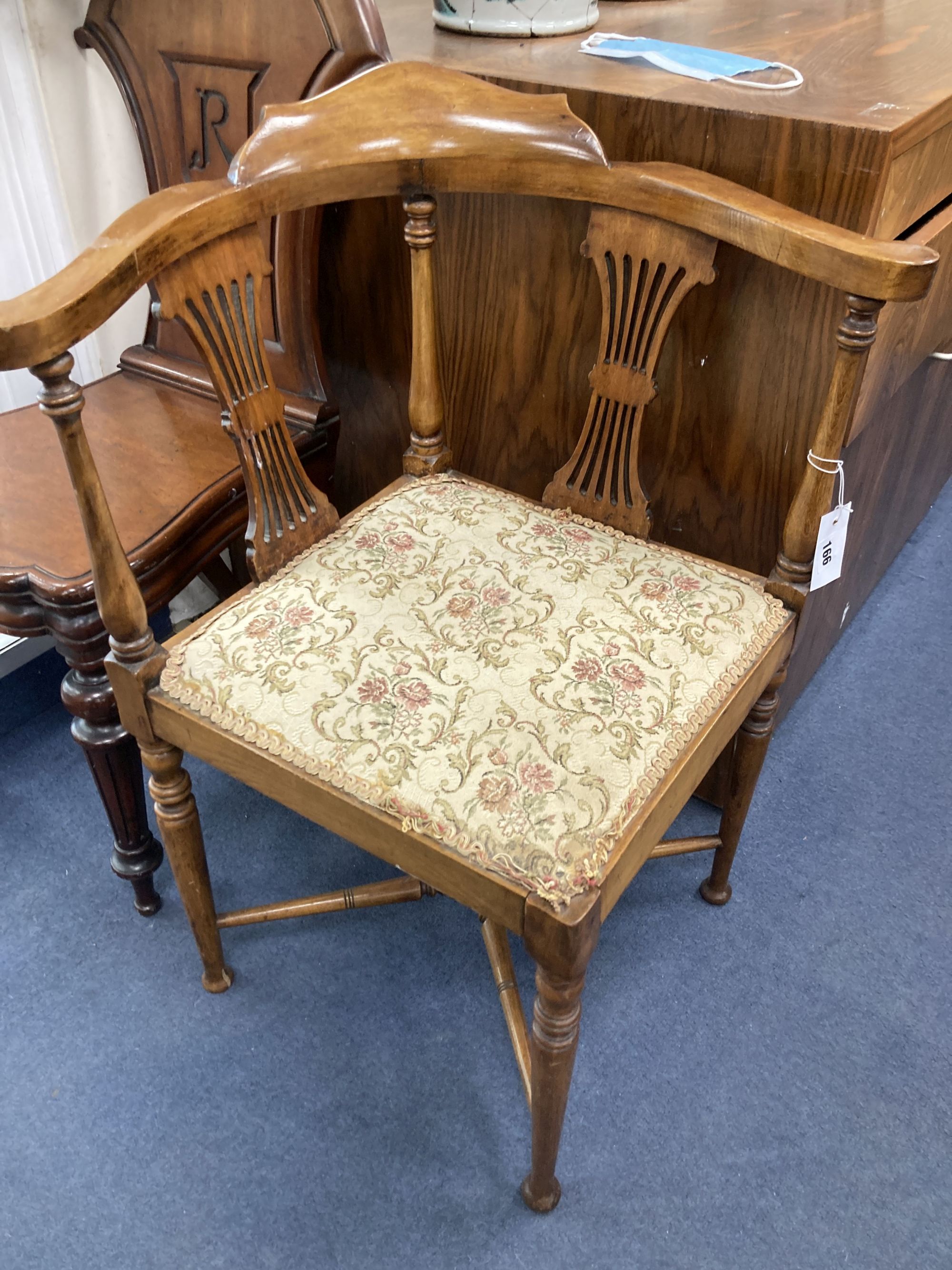 A Victorian mahogany hall chair and an Edwardian mahogany corner elbow chair